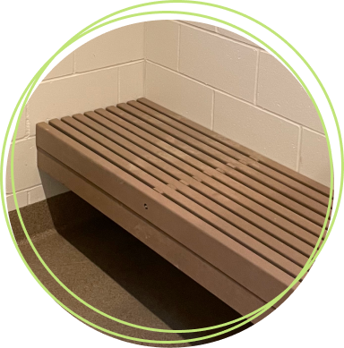 composite lumber bench in campground shower